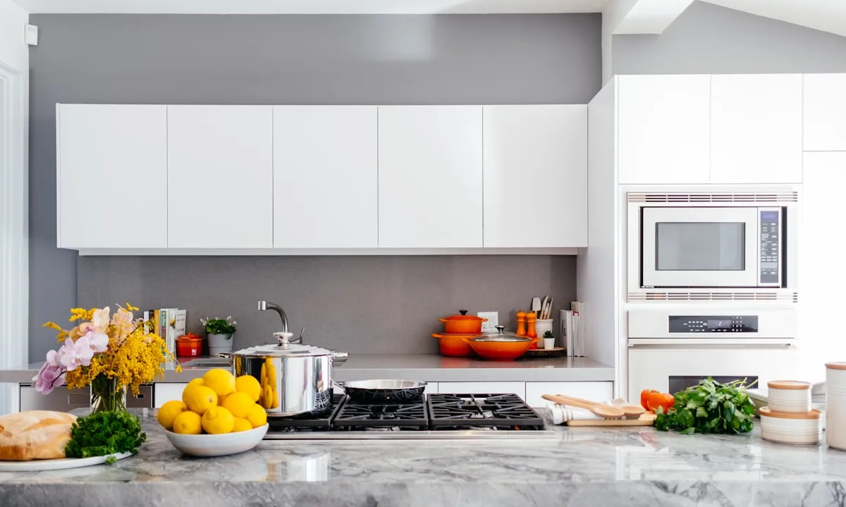Modern residential kitchen sink area for odor and mounting removal service