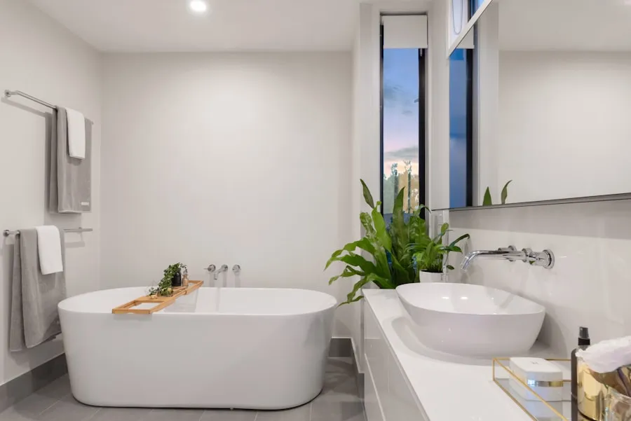 Wall-mounted chrome faucet above a white vessel sink
