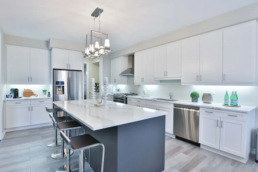 Modern kitchen with chrome faucet and undermount sink after professional installation