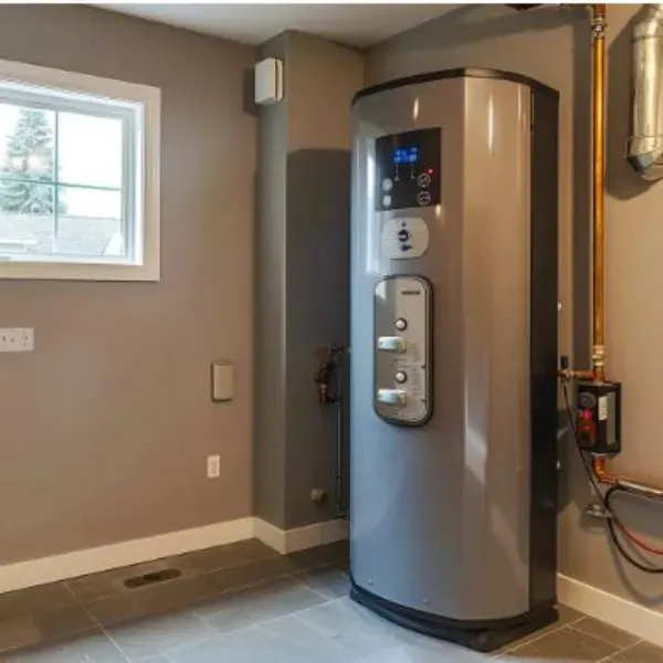 Professional installation of a modern hybrid heat pump water heater with digital controls in a residential utility room