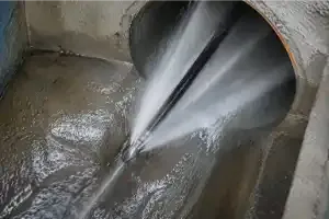 High-pressure hydro jetting cleansing grease and sludge